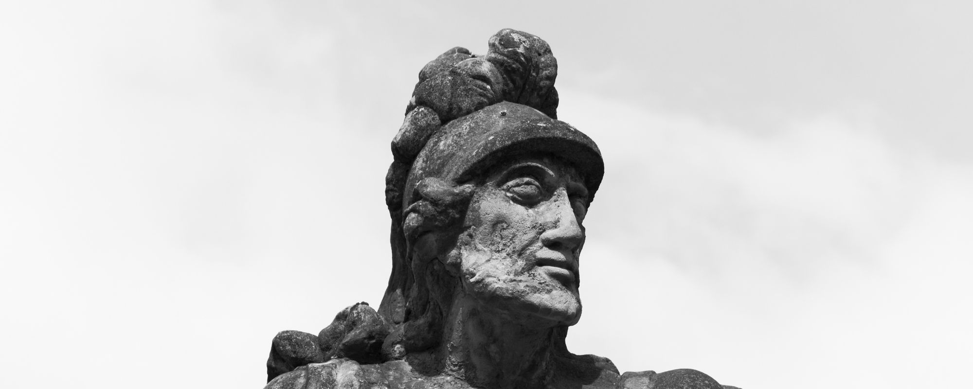 Head detail of an ancient statue of a man